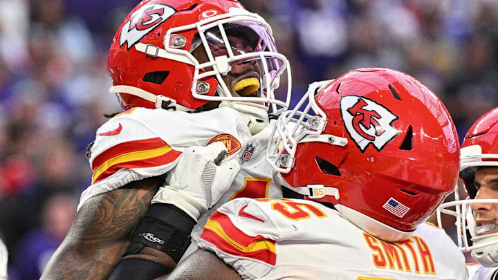 Oct 8, 2023; Minneapolis, Minnesota, USA; Kansas City Chiefs wide receiver Rashee Rice (4) and guard Trey Smith (65) react after a touchdown against the Minnesota Vikings at U.S. Bank Stadium. Mandatory Credit: Jeffrey Becker-Imagn Images