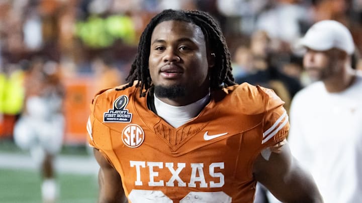 Dec 21, 2024; Austin, Texas, USA; Texas Longhorns running back Jaydon Blue (23) against the Clemson Tigers during the CFP National playoff first round at Darrell K Royal-Texas Memorial Stadium. Mandatory Credit: Mark J. Rebilas-Imagn Images