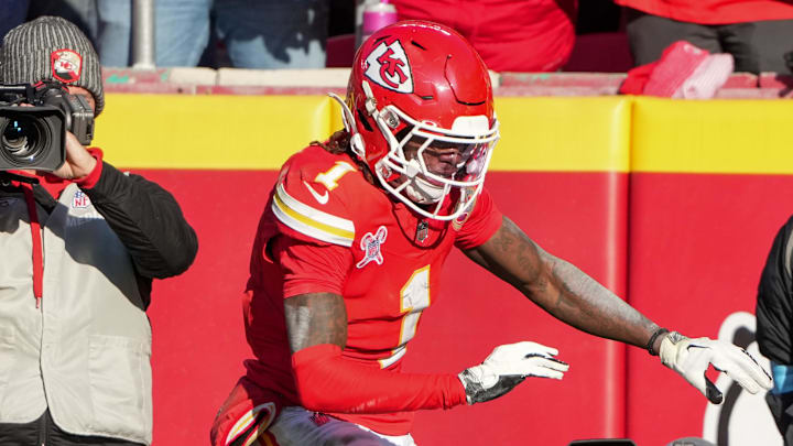 Dec 21, 2024; Kansas City, Missouri, USA; Kansas City Chiefs wide receiver Xavier Worthy (1) celebrates after scoring against the Houston Texans during the second half at GEHA Field at Arrowhead Stadium. Mandatory Credit: Denny Medley-Imagn Images