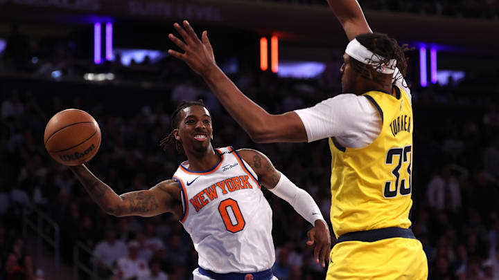 New York Knicks guard Delon Wright controls the ball against Indiana Pacers center Myles Turner. Mandatory Credit: Vincent Carchietta-Imagn Images