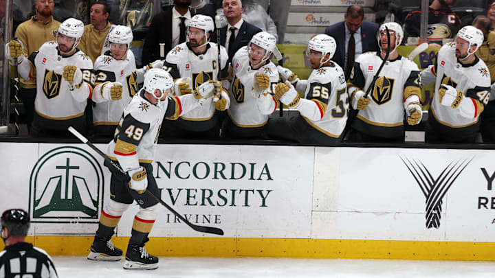 Feb 1, 2026; Anaheim, California, USA;  Vegas Golden Knights left wing Ivan Barbashev (49) celebrates with teammates after scoring a goal during the third period against the Anaheim Ducks at Honda Center. Mandatory Credit: Kiyoshi Mio-Imagn Images