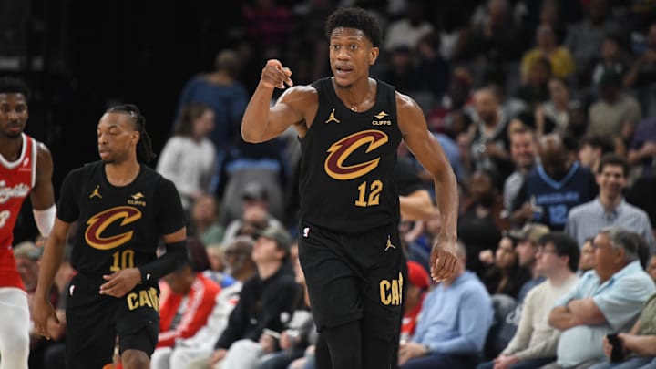 Mar 14, 2025; Memphis, Tennessee, USA; Cleveland Cavaliers small forward De'Andre Hunter (12) celebrates after making a three-pointer in the 1st quarter of the Cleveland Cavaliers vs. Memphis Grizzlies at FedExForum. Mandatory Credit: Matthew Smith-Imagn Images