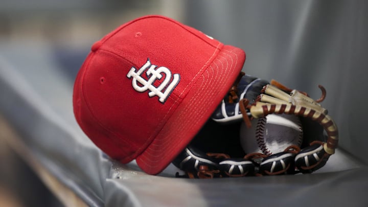 Sep 17, 2018; Atlanta, GA, USA; Detailed view of a St. Louis Cardinals hat and glove in the dugout against the Atlanta Braves in the first inning at SunTrust Park. Mandatory Credit: Brett Davis-Imagn Images
Sep 17, 2018; Atlanta, GA, USA; Detailed view of a St. Louis Cardinals hat and glove in the dugout against the Atlanta Braves in the first inning at SunTrust Park. Mandatory Credit: Brett Davis-Imagn Images