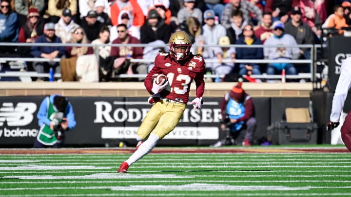 Nov 11, 2023; Chestnut Hill, Massachusetts, USA; Boston College Eagles wide receiver Dino Tomlin (13) runs the ball during the first half against the Virginia Tech Hokies at Alumni Stadium. Mandatory Credit: Eric Canha-USA TODAY Sports Nov 11, 2023; Chestnut Hill, Massachusetts, USA; Boston College Eagles wide receiver Dino Tomlin (13) runs the ball during the first half against the Virginia Tech Hokies at Alumni Stadium. Mandatory Credit: Eric Canha-USA TODAY Sports
