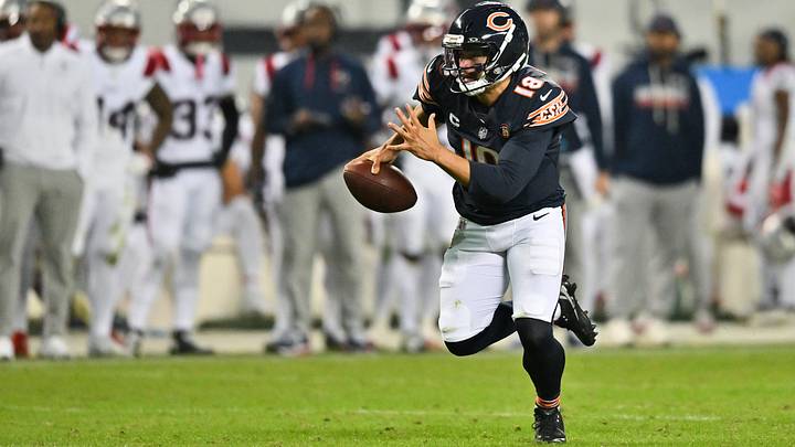 Chicago Bears quarterback Caleb Williams (18) runs the ball against the New England Patriots during the third quarter at Soldier Field. Mandatory Credit: Patrick Gorski-Imagn Images Chicago Bears quarterback Caleb Williams (18) runs the ball against the New England Patriots during the third quarter at Soldier Field. Mandatory Credit: Patrick Gorski-Imagn Images