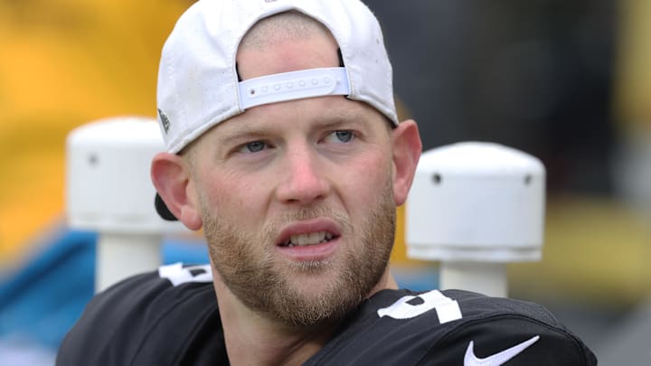  Pittsburgh Steelers kicker Chris Boswell (9) looks on from the bench against the Cincinnati Bengals during the first quarter at Acrisure Stadium.
