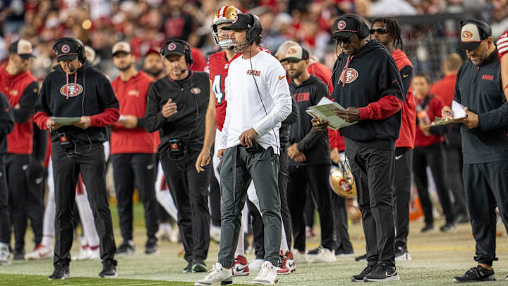 Oct 27, 2024; Santa Clara, California, USA; San Francisco 49ers head coach Kyle Shanahan looks on after the first down by the Dallas Cowboys during the third quarter at Levi's Stadium. Mandatory Credit: Neville E. Guard-Imagn Images
