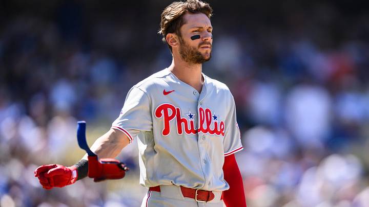 Philadelphia Phillies shortstop Trea Turner (7) throws his wrist guard after lining out during the seventh inning.