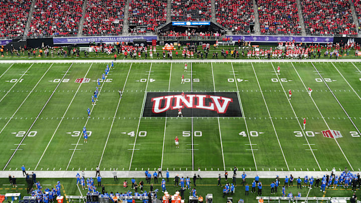 The UNLV Rebels logo at midfield during the Mountain West Championship between the UNLV Rebels and the Boise State Broncos at Allegiant Stadium. 