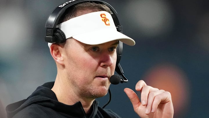 Dec 27, 2024; Las Vegas, NV, USA; Southern California Trojans head coach Lincoln Riley reacts against the Texas A&M Aggies in the second half at Allegiant Stadium. 