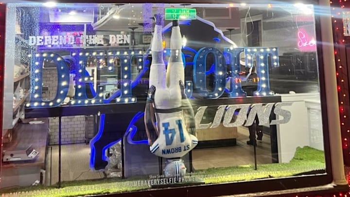 Life-size Lions-themed display with a cake of wide receiver Amon-Ra St. Brown at The Home Bakery in Rochester, Mich.