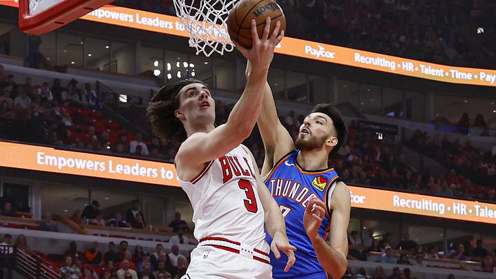 Oct 26, 2024; Chicago, Illinois, USA; Chicago Bulls guard Josh Giddey (3) goes to the basket against Oklahoma City Thunder forward Chet Holmgren (7) during the first half at United Center. Mandatory Credit: Kamil Krzaczynski-Imagn Images Oct 26, 2024; Chicago, Illinois, USA; Chicago Bulls guard Josh Giddey (3) goes to the basket against Oklahoma City Thunder forward Chet Holmgren (7) during the first half at United Center. Mandatory Credit: Kamil Krzaczynski-Imagn Images