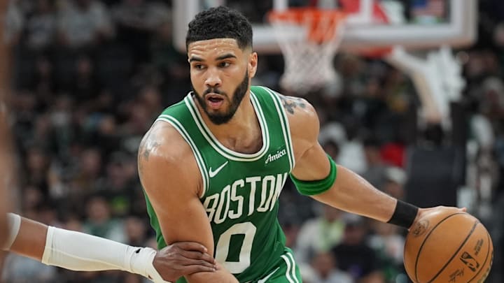 Mar 29, 2025; San Antonio, Texas, USA;  Boston Celtics forward Jayson Tatum (0) dribbles in the second half against the San Antonio Spurs at Frost Bank Center. Mandatory Credit: Daniel Dunn-Imagn Images
