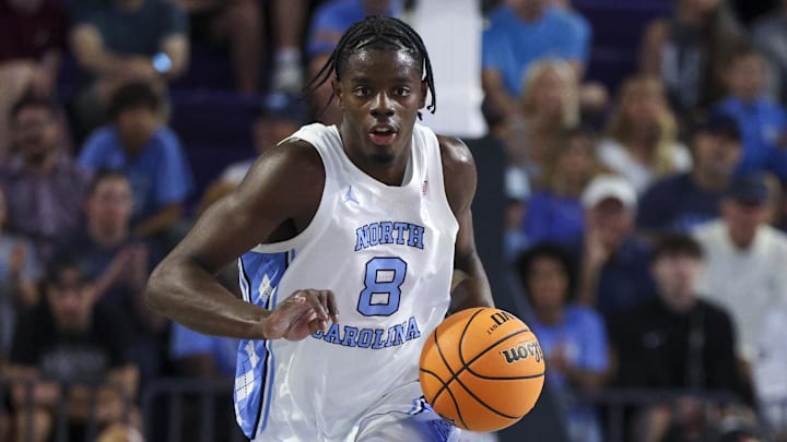 Nov 25, 2025; Fort Myers, Florida, USA; North Carolina Tar Heels forward Caleb Wilson (8) controls the ball against the St. Bonaventure Bonnies in the first half at Suncoast Credit Union Arena. Mandatory Credit: Nathan Ray Seebeck-Imagn Images