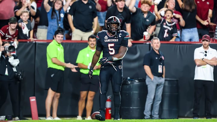 Nov 2, 2024; Columbia, South Carolina, USA; South Carolina Gamecocks running back Raheim Sanders (5) celebrates a touchdown against the Texas A&M Aggies in the fourth quarter at Williams-Brice Stadium. Mandatory Credit: Jeff Blake-Imagn Images