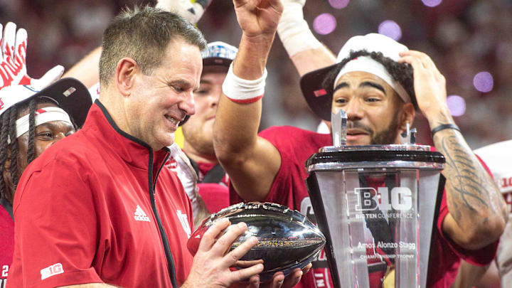 Indiana coach Curt Cignetti and the Hoosiers celebrate Dec. 6, 2025, after beating Ohio State in the Big Ten championship game at Lucas Oil Stadium in Indianapolis.