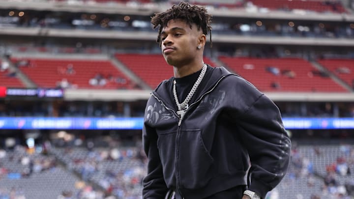 Jan 11, 2025; Houston, Texas, USA; Houston Texans wide receiver Tank Dell (3) walks on the field with crutches prior to the game against the Los Angeles Chargers in an AFC wild card game at NRG Stadium. Mandatory Credit: Troy Taormina-Imagn Images