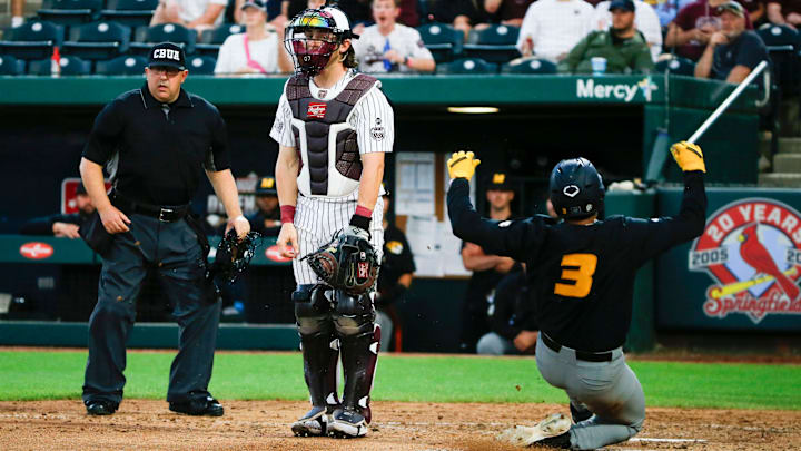 Mizzou's Danny Corona slides safely into home as the Tigers took on the Missouri State Beats at Hammons Field on Tuesday, April 16, 2024