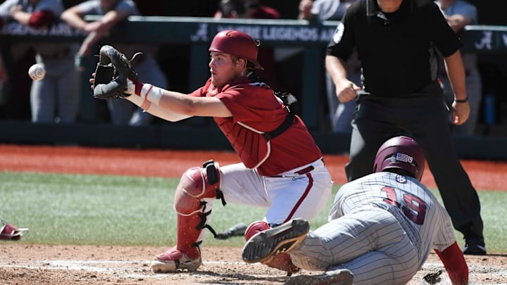 Mar 30, 2024; Tuscaloosa, Alabama, USA; Alabama catcher Mac Guscette (9) takes a throw to the plate