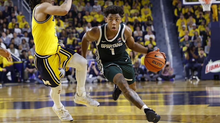 Mar 8, 2026; Ann Arbor, Michigan, USA;  Michigan State Spartans guard Jeremy Fears Jr. (1) dribbles defended by Michigan Wolverines guard Elliot Cadeau (3) in the second half at Crisler Center. Mandatory Credit: Rick Osentoski-Imagn Images