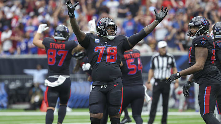 Oct 6, 2024; Houston, Texas, USA; Houston Texans offensive tackle Laremy Tunsil (78) celebrates after the Texans defeated the Buffalo Bills at NRG Stadium. Mandatory Credit: Troy Taormina-Imagn Images