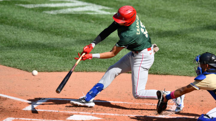 Jul 8, 2023; Seattle, Washington, USA; National League Futures designated hitter Justin Crawford (13) of the Philadelphia Phillies hits an RBI sacrifice fly against the American League during the second inning of the All Star-Futures game at T-Mobile Park. Jul 8, 2023; Seattle, Washington, USA; National League Futures designated hitter Justin Crawford (13) of the Philadelphia Phillies hits an RBI sacrifice fly against the American League during the second inning of the All Star-Futures game at T-Mobile Park.