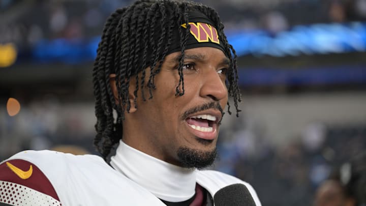 Washington Commanders quarterback Jayden Daniels (5) is interviewed after the game against the Los Angeles Chargers at SoFi Stadium. 