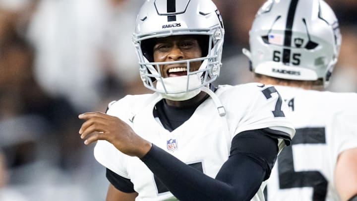Aug 23, 2025; Glendale, Arizona, USA; Las Vegas Raiders quarterback Geno Smith (7) celebrates a touchdown against the Arizona Cardinals during a preseason NFL game at State Farm Stadium. Mandatory Credit: Mark J. Rebilas-Imagn Images Aug 23, 2025; Glendale, Arizona, USA; Las Vegas Raiders quarterback Geno Smith (7) celebrates a touchdown against the Arizona Cardinals during a preseason NFL game at State Farm Stadium. Mandatory Credit: Mark J. Rebilas-Imagn Images