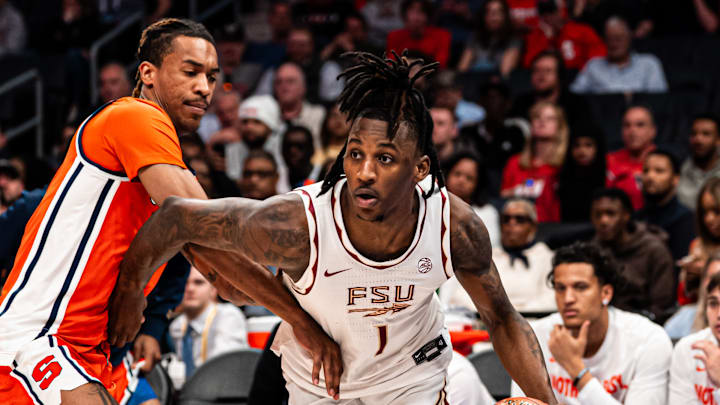 Florida State Seminoles forward Jamir Watkins (1) drives the ball against the Syracuse Orange in the 2025 ACC Tournament in Charlotte, North Carolina Florida State Seminoles forward Jamir Watkins (1) drives the ball against the Syracuse Orange in the 2025 ACC Tournament in Charlotte, North Carolina