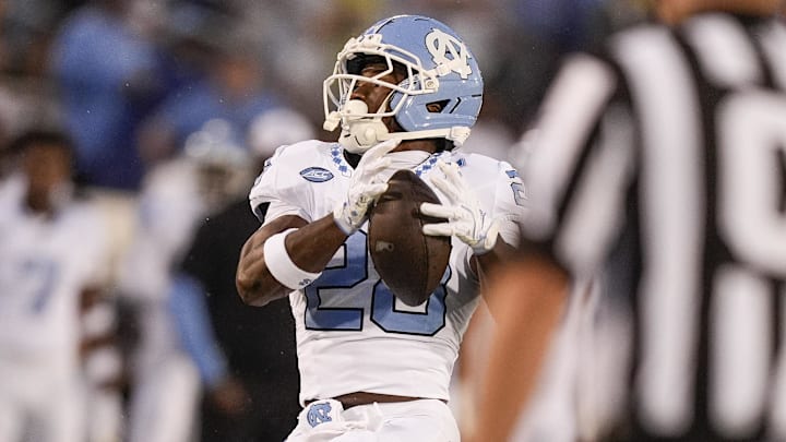 Sep 6, 2025; Charlotte, North Carolina, USA; North Carolina Tar Heels running back Benjamin Hall (28) makes a catch  during the first quarter against the Charlotte 49ers at Jerry Richardson Stadium. Mandatory Credit: Jim Dedmon-Imagn Images
