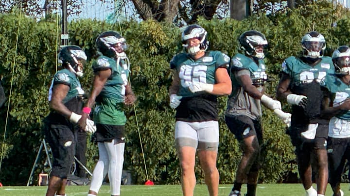 Eagles rookie defensive lineman Ty Robinson goes through warmups during a Week 7 practice.