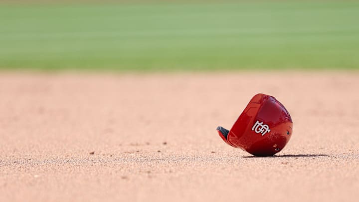 Apr 20, 2025; New York City, New York, USA; The helmet of St. Louis Cardinals right fielder Jordan Walker (not pictured) rests in the base path during the sixth inning against the New York Mets at Citi Field. Mandatory Credit: Vincent Carchietta-Imagn Images
