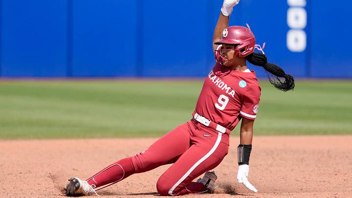 Oklahoma's Tia Milloy slides into second at the 2025 WCWS. Oklahoma's Tia Milloy slides into second at the 2025 WCWS.
