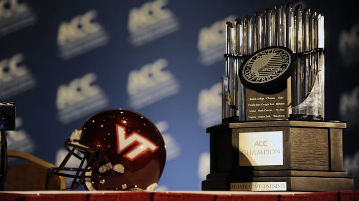 July 23, 2012; Greensboro, NC, USA; The helmet of the Virginia Tech Hookies and the ACC Championship trophy during the ACC media day at the Grandover Resort in Greensboro NC. Mandatory Credit: Sam Sharpe-Imagn Images July 23, 2012; Greensboro, NC, USA; The helmet of the Virginia Tech Hookies and the ACC Championship trophy during the ACC media day at the Grandover Resort in Greensboro NC. Mandatory Credit: Sam Sharpe-Imagn Images