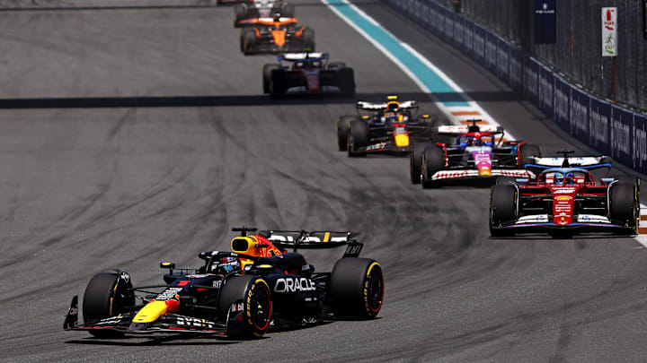 May 4, 2024; Miami Gardens, Florida, USA; Red Bull Racing driver Max Verstappen (1) lead the field into turn one during the F1 Sprint Race at Miami International Autodrome. Mandatory Credit: Peter Casey-Imagn Images