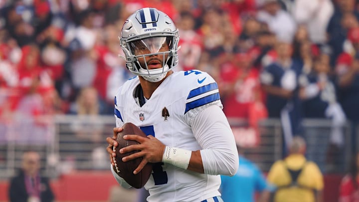 Prescott threw for 243 yards, two touchdowns and two interceptions in the Cowboys' 30–24 loss.