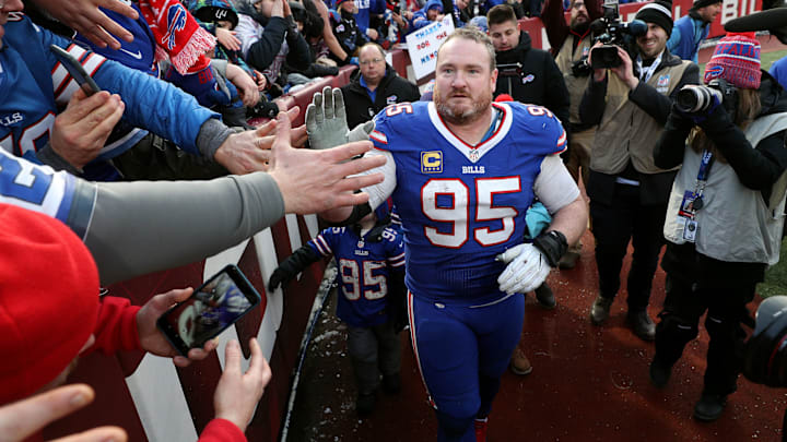 Kyle Williams greets fans before a game.
