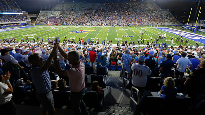 Kansas Jayhawks fans yell out after a play during the second half of the game against West Virginia Mountaineers at David Booth Kansas Memorial Stadium on Sept. 20, 2025.