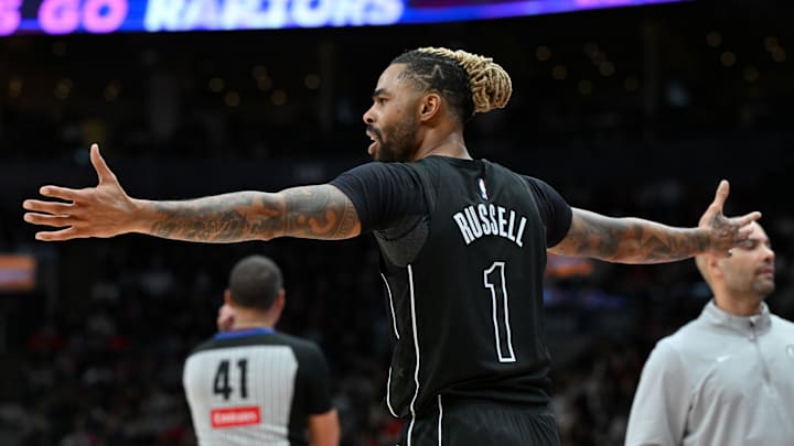 Jan 1, 2025; Toronto, Ontario, CAN; Brooklyn Nets guard D'Angelo Russell (1) reacts after being called for a foul against the Toronto Raptors in the second half at Scotiabank Arena. Mandatory Credit: Dan Hamilton-Imagn Images Jan 1, 2025; Toronto, Ontario, CAN; Brooklyn Nets guard D'Angelo Russell (1) reacts after being called for a foul against the Toronto Raptors in the second half at Scotiabank Arena. Mandatory Credit: Dan Hamilton-Imagn Images