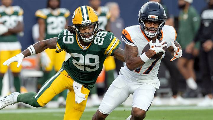 August 21, 2026, Denver, Colorado, USA: Broncos WR JAYLEN WADDLE runs for big yardage aft a catch with Packers S XAVIER MCKINNEY closes in during the 1st. Half at Empower Field at Mile High Friday evening. Packers beat the Broncos in Pre-Season 33-13. August 21, 2026, Denver, Colorado, USA: Broncos WR JAYLEN WADDLE runs for big yardage aft a catch with Packers S XAVIER MCKINNEY closes in during the 1st. Half at Empower Field at Mile High Friday evening. Packers beat the Broncos in Pre-Season 33-13.
