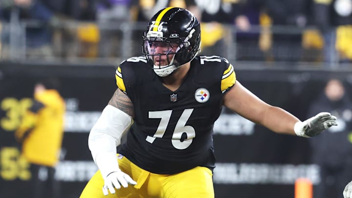 Jan 4, 2026; Pittsburgh, Pennsylvania, USA;  Pittsburgh Steelers offensive tackle Troy Fautanu (76) blocks at the line of scrimmage against the Baltimore Ravens during the first quarter at Acrisure Stadium. Mandatory Credit: Charles LeClaire-Imagn Images