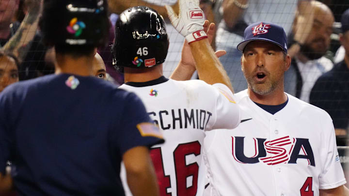 USA manager Mark DeRosa high-fives first baseman Paul Goldschmidt (46) during the World Baseball Classic against Great Britain at Chase Field in Phoenix on March 11, 2023. USA manager Mark DeRosa high-fives first baseman Paul Goldschmidt (46) during the World Baseball Classic against Great Britain at Chase Field in Phoenix on March 11, 2023.