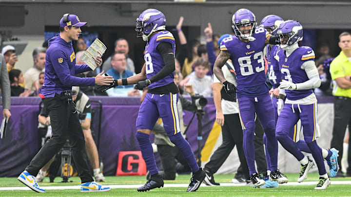 Dec 8, 2024; Minneapolis, Minnesota, USA; Minnesota Vikings head coach Kevin O'Connell reacts with wide receiver Justin Jefferson (18), wide receiver Jalen Nailor (83) and wide receiver Jordan Addison (3) after a touchdown reception against the Atlanta Falcons during the second quarter at U.S. Bank Stadium. Dec 8, 2024; Minneapolis, Minnesota, USA; Minnesota Vikings head coach Kevin O'Connell reacts with wide receiver Justin Jefferson (18), wide receiver Jalen Nailor (83) and wide receiver Jordan Addison (3) after a touchdown reception against the Atlanta Falcons during the second quarter at U.S. Bank Stadium.