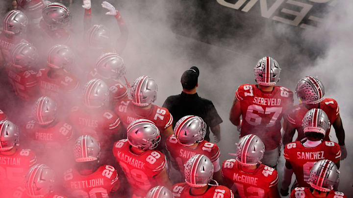 Ohio State Buckeyes head coach Ryan Day leads his team on the field prior to the NCAA football game against the Minnesota Golden Gophers at Ohio Stadium in Columbus on Oct. 4, 2025.
