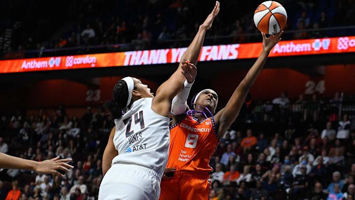Sep 10, 2025; Uncasville, Connecticut, USA; Connecticut Sun forward Aaliyah Edwards (8) shoots a layup against Atlanta Dream forward Brionna Jones (24) during the second half at Mohegan Sun Arena. 