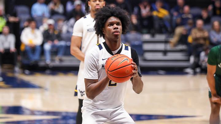 Nov 30, 2025; Morgantown, West Virginia, USA; West Virginia Mountaineers guard Amir Jenkins (2) shoots a free throw during the second half against the Mercyhurst Lakers at Hope Coliseum. Mandatory Credit: Ben Queen-Imagn Images