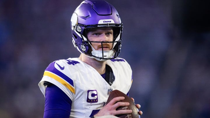 Jan 13, 2025; Glendale, AZ, USA; Minnesota Vikings quarterback Sam Darnold (14) against the Los Angeles Rams during an NFC wild card game at State Farm Stadium. Jan 13, 2025; Glendale, AZ, USA; Minnesota Vikings quarterback Sam Darnold (14) against the Los Angeles Rams during an NFC wild card game at State Farm Stadium.
