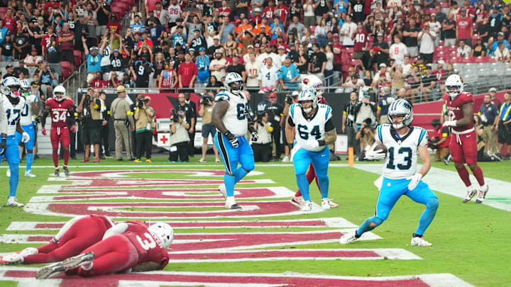 Sep 14, 2025; Glendale, Arizona, USA;  Carolina Panthers wide receiver Hunter Renfrow (13) receives a pass to complete a touchdown  during the fourth quarter against the Arizona Cardinals at State Farm Stadium. Mandatory Credit: Joe Camporeale-Imagn Images
