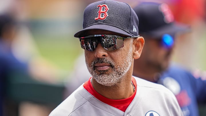 Boston Red Sox manager Alex Cora (13) shown in the dugout before the game against the Atlanta Braves at Truist Park.