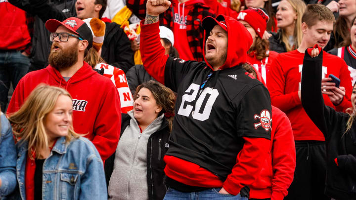 Nov 11, 2023; Lincoln, Nebraska, USA; A Nebraska Cornhuskers fan during the third quarter against the Maryland Terrapins at Memorial Stadium. Mandatory Credit: Dylan Widger-USA TODAY Sports Nov 11, 2023; Lincoln, Nebraska, USA; A Nebraska Cornhuskers fan during the third quarter against the Maryland Terrapins at Memorial Stadium. Mandatory Credit: Dylan Widger-USA TODAY Sports